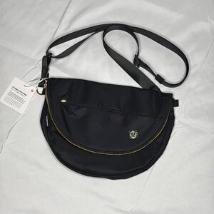 Lululemon Athletica Black with Gold Zipper All Night Festival Bag 5L brand new
